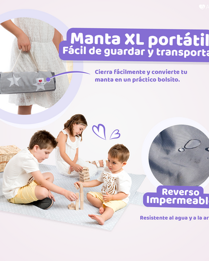 Niños disfrutando de un picnic sobre la Manta JUMBO GIGANTE de Amamantas en color grafito, impermeable y fácil de transportar.
